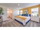 Spacious main bedroom with en-suite bathroom and large windows at 6546 Coffee Theme St # Lot 11, North Las Vegas, NV 89084