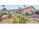 Large backyard with pool, patio, and seating area at 659 Glenwood Ln, Henderson, NV 89002