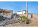 Landscaped backyard with patio and seating area at 659 Glenwood Ln, Henderson, NV 89002