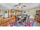 Dining area features wood table and access to kitchen at 659 Glenwood Ln, Henderson, NV 89002