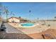 Inviting kidney-shaped pool in backyard oasis at 659 Glenwood Ln, Henderson, NV 89002