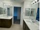 Double vanity bathroom with modern finishes and plenty of counter space at 6632 Nimbus Ave # Lot 25, Las Vegas, NV 89130