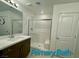 Primary bathroom with walk-in shower and modern vanity at 6632 Nimbus Ave # Lot 25, Las Vegas, NV 89130