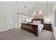 Bright bedroom with a barn door and en-suite bathroom at 6973 Emerald Springs Ln, Las Vegas, NV 89113