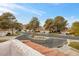 Elevated view of the quiet, tree-lined neighborhood with well-maintained homes at 6973 Emerald Springs Ln, Las Vegas, NV 89113