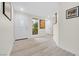 Light and airy entryway with hardwood floors at 6973 Emerald Springs Ln, Las Vegas, NV 89113