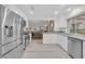 Modern kitchen with stainless steel appliances and gray countertops at 6973 Emerald Springs Ln, Las Vegas, NV 89113