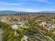 Community entrance with landscaping and distant city view at 7 Summit Walk Trl, Henderson, NV 89052