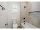 Clean bathroom with shower/tub combo and neutral tile at 7 Summit Walk Trl, Henderson, NV 89052