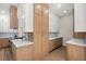 Kitchen pantry with white and light wood cabinets and ample shelving at 7 Summit Walk Trl, Henderson, NV 89052