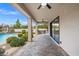 Relaxing covered patio with built-in BBQ and tile flooring at 7 Summit Walk Trl, Henderson, NV 89052