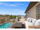 Spacious patio with stunning views, comfortable seating, and a pool at 7 Summit Walk Trl, Henderson, NV 89052