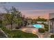 Expansive backyard oasis featuring a refreshing pool and spa at 7 Summit Walk Trl, Henderson, NV 89052