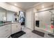 Elegant bathroom with double vanity and large shower at 7141 Liberty Landing St, Las Vegas, NV 89166