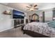 Spacious bedroom with a large TV and walk-in closet at 7141 Liberty Landing St, Las Vegas, NV 89166