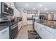 Modern kitchen with stainless steel appliances at 7141 Liberty Landing St, Las Vegas, NV 89166