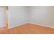 Simple bedroom with wood floors and closet access at 7322 Fools Gold St # 101, Las Vegas, NV 89149