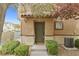 Private entrance with landscaping and AC unit at 7322 Fools Gold St # 101, Las Vegas, NV 89149