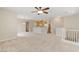 Spacious living room with open kitchen and loft at 7322 Fools Gold St # 101, Las Vegas, NV 89149