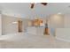 Spacious living room with open kitchen and loft at 7322 Fools Gold St # 101, Las Vegas, NV 89149