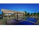 Expansive pool and patio area with outdoor seating at 7349 Olive Creek Ct, Las Vegas, NV 89117