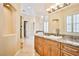 Upscale bathroom with granite vanity and walk-in shower at 768 Tozzetti Ln, Henderson, NV 89012