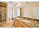 Bathroom with granite double vanity and glass shower at 768 Tozzetti Ln, Henderson, NV 89012