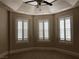 Bright bedroom with three windows and plantation shutters at 768 Tozzetti Ln, Henderson, NV 89012