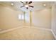 Well-lit bedroom with ceiling fan and window with plantation shutters at 768 Tozzetti Ln, Henderson, NV 89012