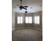 Spacious bedroom with two ceiling fans and large windows with plantation shutters at 768 Tozzetti Ln, Henderson, NV 89012