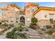 Front view of two-story house with stone accents at 768 Tozzetti Ln, Henderson, NV 89012