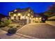 Luxury home with stone and stucco exterior, 3-car garage at 768 Tozzetti Ln, Henderson, NV 89012