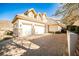 Three-car garage with paver driveway at 768 Tozzetti Ln, Henderson, NV 89012