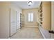 Spacious walk-in closet with ample shelving and drawers at 768 Tozzetti Ln, Henderson, NV 89012