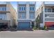 Contemporary two-story home with gray exterior and attached garage at 7777 Tempest Sol Ave, Las Vegas, NV 89113