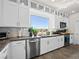 Well-equipped kitchen featuring stainless steel appliances and ample cabinetry at 7777 Tempest Sol Ave, Las Vegas, NV 89113