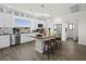 Modern kitchen with stainless steel appliances and an island at 7777 Tempest Sol Ave, Las Vegas, NV 89113