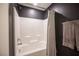 Bathroom with shower/tub combo and dark gray walls at 8034 Mercury Skye St, Las Vegas, NV 89166