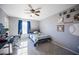 Bedroom with a baseball-themed decor and built-in desk at 8034 Mercury Skye St, Las Vegas, NV 89166