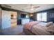 Bright bedroom with king bed, ensuite bath access, and ample closet space at 8034 Mercury Skye St, Las Vegas, NV 89166