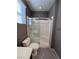 Small bathroom with a shower/tub combo and tile floor at 8157 Lennox View Ln, Las Vegas, NV 89113