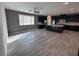 Spacious living room with tile flooring and ceiling fan at 8157 Lennox View Ln, Las Vegas, NV 89113