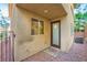 Small backyard with gravel and a door at 8477 Orly Ave, Las Vegas, NV 89143