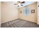 Bedroom with ceiling fan, carpet flooring, and window with blinds at 8477 Orly Ave, Las Vegas, NV 89143