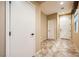 Entryway with tile flooring, white door and closet at 8477 Orly Ave, Las Vegas, NV 89143