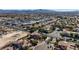 Expansive aerial view of a residential area showcasing diverse architecture and well-maintained landscaping at 8490 Via De Bellasidra Ct, Las Vegas, NV 89123