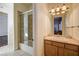 Neutral bathroom with a shower and bath combo and an vanity at 8490 Via De Bellasidra Ct, Las Vegas, NV 89123