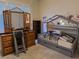 bedroom with bunk bed, dresser, and mirror at 8490 Via De Bellasidra Ct, Las Vegas, NV 89123