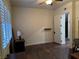 Bedroom with hardwood floors and plantation shutters at 8490 Via De Bellasidra Ct, Las Vegas, NV 89123