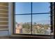 Window view of the Las Vegas city skyline and mountains in the distance at 8490 Via De Bellasidra Ct, Las Vegas, NV 89123